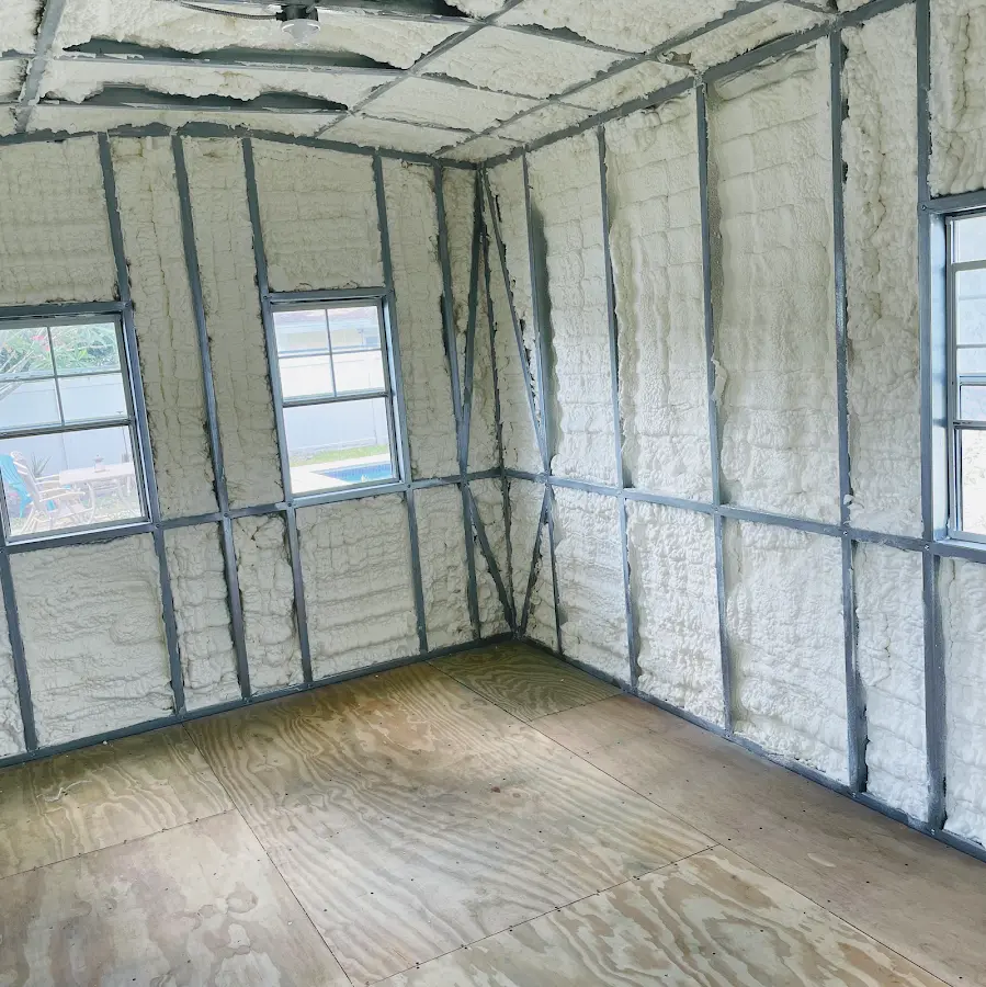 Closed-cell spray foam insulation applied to wall cavities in a residential project in Berwyn